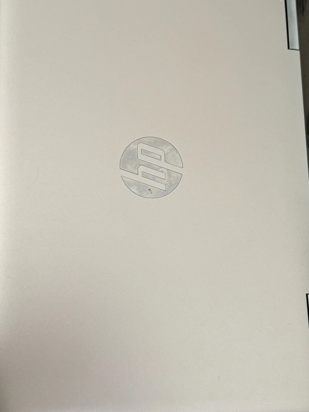 HP Silver-White Laptop with Center Logo